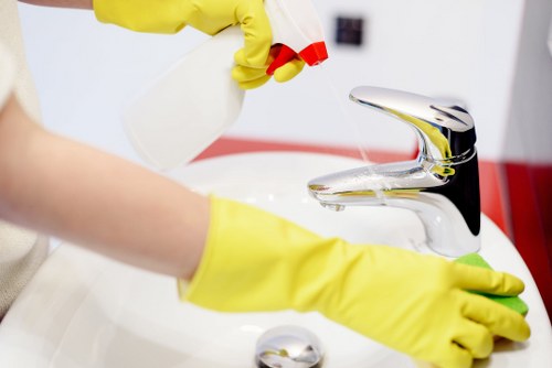 House cleaner preparing a Westkensington home for a thorough local cleaning visit