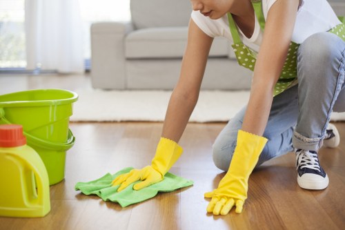Professional office cleaning team preparing a commercial workspace in Westkensington